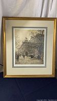 Framed drawing full view showing sepia-tone street scene of Wien Oper with mat and gold frame.