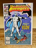 Front cover of The West Coast Avengers #45 comic book showing white Vision and title text