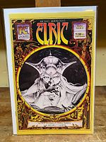 Full front cover of the comic book Michael Moorcock's Elric #1, showing the title text, price, and cover art featuring Elric with fantasy-themed border in red and gold.