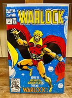 Front cover of Warlock #1 comic showing the character in costume with a starry background and price $2.50.