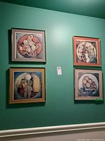Four framed prints with mats arranged on a teal green wall. Each print is approximately square, sized 15.5x15.5 inches.