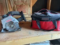 Photo showing Craftsman circular saw and matching branded carrying case on a wooden surface