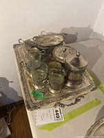 Overview photo showing entire tea service set including tray, cups, sugar bowl, and container