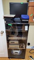 Full view of stereo cabinet loaded with electronics