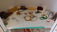 Overview of all jewelry pieces laid out on white background