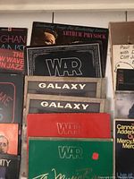 Photo showing several vinyl album covers dominated by jazz and soul themes including War, Galaxy, Arthur Prysock.