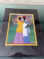 Full view of matted print showing two Gullah women with signature and title.