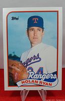 Front of 1989 Topps Traded Nolan Ryan baseball card showing player image and team ID.