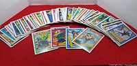 Multiple 1990 Impel Marvel Series 1 trading cards displayed in a semi-circular layout showing various characters and duplicates.