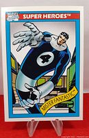Front photo of 1990 Impel Marvel Series 1 Mister Fantastic trading card on clear stand