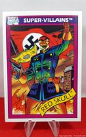 Front side of 1990 Impel Marvel Series 1 Red Skull trading card showing Red Skull character artwork with Nazi flag background.