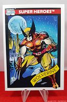 Front of the 1990 Impel Marvel Series 1 Wolverine #10 trading card showing Wolverine artwork with city and moon background.