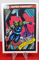 Front side of the 1990 Impel Marvel Series 1 Wolverine #37 trading card showing Wolverine in his classic costume with claws drawn.