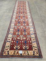 Full-length view of the runner rug laid on concrete floor