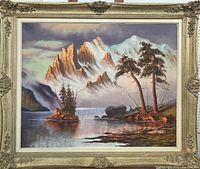 Framed original signed oil painting showing entire artwork depicting a mountain scene with lake and trees.