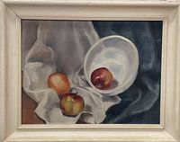 Full view of the framed oil painting showing apples, orange, white bowl, and draped fabric in a still life composition.