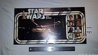 Top view of the original Star Wars board game box showing the Star Wars logo, key characters, and the title Escape Death Star.