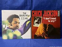 Front covers of 'The Brand New Z.Z. Hill' and 'I Don't Want to Cry!' Chuck Jackson vinyl records, showing the artwork and titles.