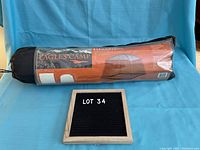 Full packed screen house in carry bag with Eagle's Camp branding visible.