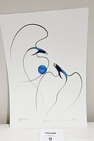 Full view of the acrylic print showing the artwork with two stylized birds and numbering/signing visible