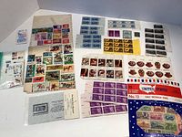 Full overview of mixed stamps collection including sheets and singles from various countries with different themes.