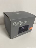 Photo of the front side of the dash camera box showing branding and main features.
