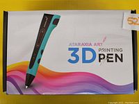 Photo of Ataraxia Art 3D Printing Pen box showing pen image and colorful wave design