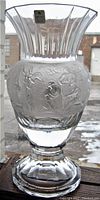 Clear Medici Italian art glass vase with frosted etched classical figures and flared rim, showing overall form and Medici label on the vase body.