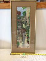 Full view of the watercolor painting framed behind glass, showing the entire artwork and frame dimensions.