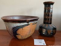 Bowl and vase side by side showing size and surface glaze patterns