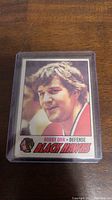 Front side of 1977-78 Bobby Orr hockey card with player image and Black Hawks logo.