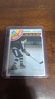 Front of 1978-79 Darryl Sittler O-Pee-Chee hockey card showing player in Maple Leafs uniform and 2nd Team All-Star indication.