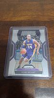 Front side of Kobe Bryant NBA Dominance trading card with image of player in Lakers jersey number 24.