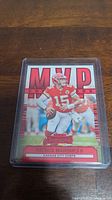Front side of the Patrick Mahomes II MVP Contenders football trading card showing player image and logo.