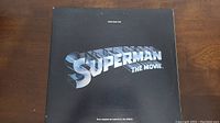 Front cover of the vinyl record album showing the 3D Superman logo on a black background with text 'Superman The Movie' and 'Original Sound Track' at the top.