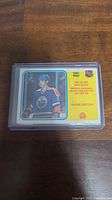 Front photo of 1981-82 Wayne Gretzky hockey card showing him in Edmonton Oilers uniform with the Goal Leader label