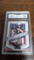 Front of the Zach Wilson rookie card graded Gem MT 10 by GMA in a plastic slab.