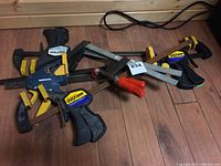 Overview photo showing 6 clamps of varying sizes including brands Quick-Grip and Mastercraft, with visible wear.