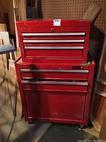 Front view of two-piece red Waterloo tool chest with top chest on bottom cabinet