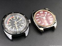 Shows both Lucerne watches side by side highlighting different dial colors and wear.