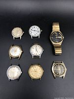 Overview of 8 vintage wristwatches showing various conditions and dial types
