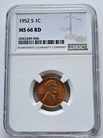 Front side of 1952 S Lincoln Wheat Cent coin in graded NGC holder showing Abraham Lincoln profile and date.