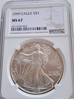 Obverse side of 1999 Silver Eagle coin graded MS-67 in protective NGC holder showing Liberty and date 1999.