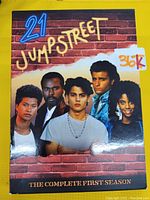 Front cover of DVD set showing 21 Jumpstreet cast and title with price sticker