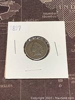Front side of the 1897 Indian Head Penny showing the Liberty head with Native American headdress.