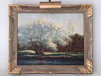 View of entire framed oil painting with mounted picture light, showing details of painting and frame.