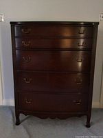 Front view of wood chest showing overall condition and style