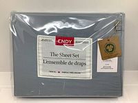Photo of packaged ENDY sheet set showing label with product and brand name, material and thread count information.