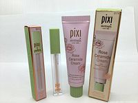 Photo of Pixi Skintreats Rose Ceramide Cream tube with its box, and Pixi by Petra Lip Lift Max lip plumper with its box, displayed side by side on white background.