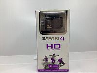 Front retail packaging showing Safari 4 HD action camera in waterproof housing with branding and activity images